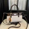 Bolso de mano de alta calidad estilo coreano para mujer, nuevo bolso de hombro casual de moda 2026, bolso cruzado tipo cubo elegante para el día a día
