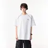 Camiseta blanca de manga corta para hombre con estampado de letras pesadas estilo americano, marca de moda, ajuste holgado de verano, versátil, top deportivo juvenil de media manga