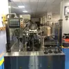 Máquina de envasado al vacío de prueba de alimentación automática de bolsas máquina de envasado al vacío de prueba de alimentación de bolsas máquina de envasado de alimentación de bolsas de polvo de arroz