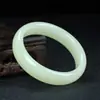 Venta al por mayor de fábrica Xinjiang Hotan grasa de cordero Jade Blanco Jade Jade boutique versión ancha mongola exterior gruesa no frágil pulsera para mujer