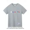 Camiseta de Manga Corta de Algodón Puro Unisex 2026 Nueva Camiseta Bordada Holgada Ins Marca de Moda Estilo Japonés Hong Kong Top Verano