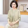 Camisa base de tricô estilosa para mães, nova moda de outono para mulheres de meia-idade, novo conjunto de duas peças estilo chinês para primavera e outono para mulheres de meia-idade e idosas