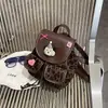 Mochila feminina retrô transfronteiriça em alta este ano 2026 nova moda versátil grande capacidade requintada bolsa escolar