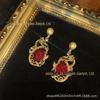 Ocidental medieval banhado a cobre 18 velho retro ouro dragão design com brincos de strass vermelho pingente indústria pesada pequeno