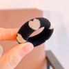 Explosiones de otoño e invierno coreanas anillo para toalla de rayas blancas y negras con cara sonriente anillo para el pelo de niños al por mayor pelo grueso pelo suave accesorios para el pelo