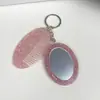 Novo Espelho Oval Espelho Multifuncional Pente Chaveiro Moda Versátil Pingente de Bolsa Chave Ferramenta de Maquiagem Portátil