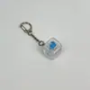 Chaveiro de botão de PC de alta transparência para descompressão 123456 chaves nove chaves grade Tianzi testador de interruptor pingente luminoso transfronteiriço em estoque