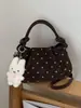 Bolso plisado de nicho súper popular para mujer, nuevo bolso cruzado versátil de moda 2026, exquisito bolso de mano tipo dumpling, bolso tote pequeño