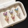 Nuevos pendientes de estilo chino S925 anti-plata para mujer, pendientes de mariposa de cristal de color, pendientes de hadas, elegantes pendientes de mariposa para mujer.