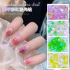 Red nuevo arte de uñas diamante con forma de aurora arcoíris joyería al por mayor color mágico Joker hielo a través de uñas diamante súper flash mixto
