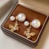 Aretes de mariposa de perlas grandes y pequeñas, anverso y reverso con incrustaciones completas de diamantes, aretes de moda para mujer 2026, nuevos y de alta gama