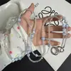 Lujo ligero y sensación de alta gama, cadena cruzada para teléfono con cuentas de cristal iridiscente azul claro, llavero de diseño creativo, cadena larga para bolsos