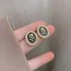 Pendientes de botón de perla rosa con pasador de plata s925 Estilo retro japonés y coreano Pendientes de lujo ligero para mujer Moda nueva 2024