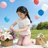 Ropa Infantil Coreana 2026 Verano Nuevo Estilo Tops de Manga Corta para Niñas y Pantalones de Campana Color Sólido Elástico Casual Dulce Conjunto de Dos Piezas