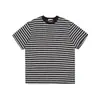 Camiseta Listrada Manga Curta Masculina Verão Nova Marca Tendência Senso de Design Retrô Listras Pretas e Brancas Color Blocking Solta Meia Manga Top