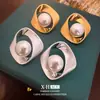 Anillo Mobius Aguja de Plata Pendientes de Perla Geométricos Pendientes con Diseño Recortado Cepillado Europeos y Americanos Pendientes de Lujo Accesible