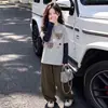 Conjunto de Ropa de Otoño para Niñas 2026 Nuevo Estilo Top de Dos Piezas Falso para Niños Ropa Moderna de Primavera y Otoño para Niñas Mayores