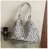 Bolsa feminina de grande capacidade, nova coleção outono 2026, bolsa de ombro versátil e fashion, bolsa tote casual com estampa de estrelas estilo coreano