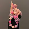 Estampado de Leopardo Bola de Pelo Lazo Cadena Corta Colgante de Muñeca Llavero Cámara CCD Funda para Teléfono Móvil