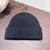 Chapéu de Lã Casual Versátil Cor Sólida Quente para Mulheres Proteção de Orelha de Inverno Chapéu de Tricô Pulôver para Proteger Contra o Frio e o Vento Tendência de Chapéu Frio para Exterior