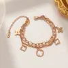Pulseira de Aço Titânio com Trevo de Quatro Folhas Vazado Dupla Camada Transfronteiriça para Meninas, Luxo Acessível, Joia de Mão Moderna e Versátil, Corrente Grossa Estilo Simples Ins