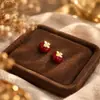 Aretes Geométricos Rojos Ankela Festivos de Año Nuevo Nicho Temperamento Venta Caliente Aretes de Botón Otoño/Invierno 2026 Venta al por Mayor de Pendientes
