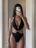 Traje de Banho Peça Única Sexy Novo para Mulheres, Verão 2027, Europeu e Americano, Transfronteiriço, Cor Sólida, Design Vazado, Emagrecedor, Roupa de Banho para Férias na Praia