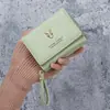 Cartera Pequeña de Mujer Transfronteriza Cuero Nuevo Monedero de Mano Cremallera Dos en Uno 70% de descuento Portatarjetas Bolsa de Almacenamiento Integrada