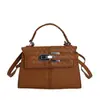 Bolsa Nova de Verão 2026 Bolsa Quadrada Pequena Design de Nicho Coreano Bolsa Transversal Moda Simples Casual Bolsa Feminina