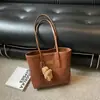 Bolsa de palha tecida de grande capacidade estilo coreano para mulheres, adequada para uso casual, trabalho, aulas da faculdade e deslocamento em 2026