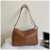 Nueva bolsa de mano grande de estilo casual para mujer de Shuai Mi, bolso de hombro simple de color liso para el día a día, bolso cruzado moderno