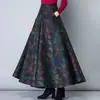 Falda de cuadros otoño e invierno para mujer retro Nueva talla grande de longitud media línea A falda de vuelo grande cintura alta adelgazante falda larga moda