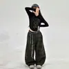 Conjunto de Outono para Meninas 2026 Novo Casual Estilo Coreano Crianças Médias e Grandes Blusa com Letras e Calça Camuflada Conjunto