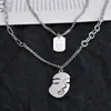 Collar de Acero de Titanio de Doble Capa de Temperamento Simple Diseño de Nicho Retrato de Cabeza de Máscara Cadena de Lana Moda para Mujer Popular en Internet ins Estilo Frío