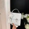 Bolsa de Ombro Dupla Estrela de Verão Feminina 2026 Nova Tendência Moda Versátil Bolsa de Mão Mochila Mini para Estudante Viagem Bolsa Quadrada