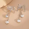 Pendientes Europeos y Americanos Temperamento Transfronterizo Largo Forma de Corazón Borla Joyería para Orejas Creativos Versátiles Pendientes de Lazo para Mujer