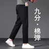 Jeans masculinos stretch brancos de Guangzhou Xintang, comprimento 7/8 ou 9/8, marca de alta qualidade e tendência, adequados para pessoas com 160cm de altura