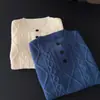 Moda coreana de estilo nuevo para Otoño/Invierno 2026, chaleco de punto sin mangas con cuello redondo y media botonadura, top versátil holgado para mujer