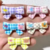 Pinza para el pelo de cuadros de dibujos animados con lazo KT, piezas acrílicas para accesorios DIY para fundas de teléfono, hebillas de zapatos y decoraciones para zapatos