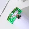 Europa y América. Pulsera Verde del Día de San Patricio Apilada con Cuentas de Arcilla Suave, Decoración de Colgante Hecho a Mano de Trébol de Cuatro Hojas de Buena Suerte