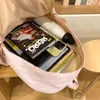 Mochila escolar casual estilo japonés para niñas, adecuada para estudiantes de secundaria, preparatoria y universidad, mochila ligera de viaje