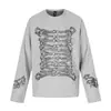 Camiseta de manga larga con estampado creativo estilo retro americano de alta costura para hombres y mujeres, top casual holgado y versátil para otoño de 2026
