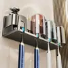 Portacepillos de dientes sin taladro, vaso para cepillos de dientes, estante integrado de almacenamiento montado en la pared, portacepillos de dientes para lavabo de baño, soporte para cepillos de dientes