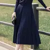 Luxo Leve 2025 Novo Conjunto de Malha Externa Saia Midi Drapada Elegante Minissaia Colorida Lisa Estampada e Tingida