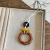 Collar ovalado de resina estilo étnico, lujo ligero con un toque de alta gama, cadena para suéter de moda vintage, collar de diseño nicho para mujer