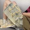 Shorts jeans amarelos masculinos soltos de verão, calças explosivas europeias populares deste ano, calças da moda da American High Street