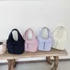 Bolsa de mão transfronteiriça 2026 verão nova bolsa de tecido de nicho estilo coreano simples versátil bolso duplo leve casual bolsa de balde