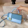 Bolso pequeño cuadrado de alta costura modelo 2026 nuevo bolso casual simple para mujer bolso de hombro cruzado moderno para ir al trabajo y llevar en la mano