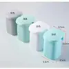 Esterilizador de cepillos de dientes inteligente directo de fábrica Portacepillos de dientes UV montado en la pared sin perforaciones Exprimidor automático de pasta de dientes