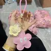 Chaveiro Flor da Fortuna em Ouro Puro 999, Pingente para Bolsa Dourado, Ornamento para Corrente de Celular, Presente Promocional para o Dia das Mães